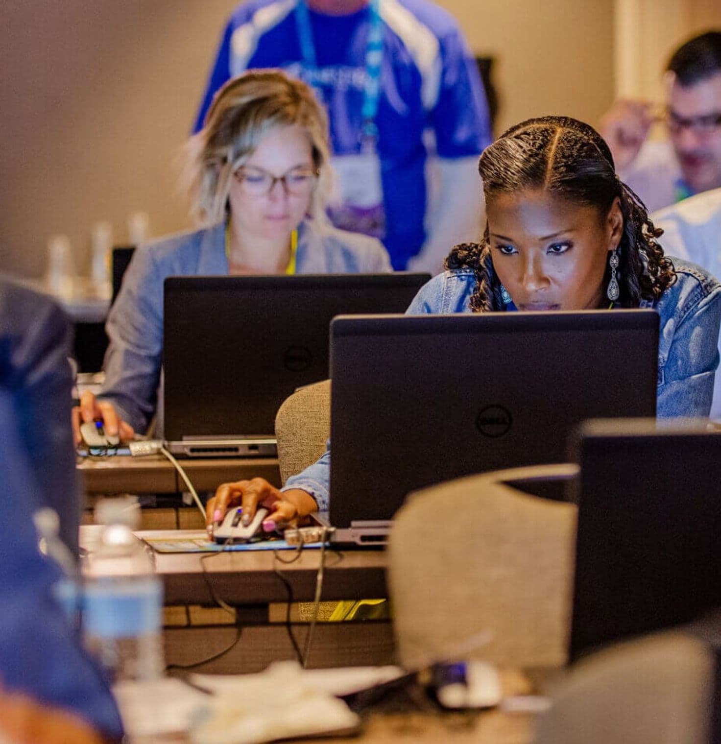 Peopl on computers at a Splash breakout session or workshop